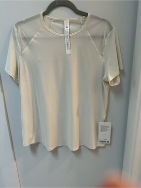 lululemon athletica Sculpt T size 12 in light ivory.